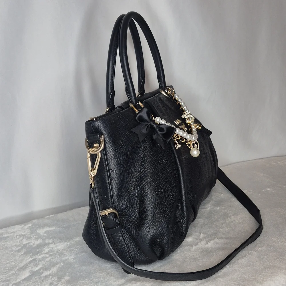 MCM Black Leather Handbag with Gold Accents